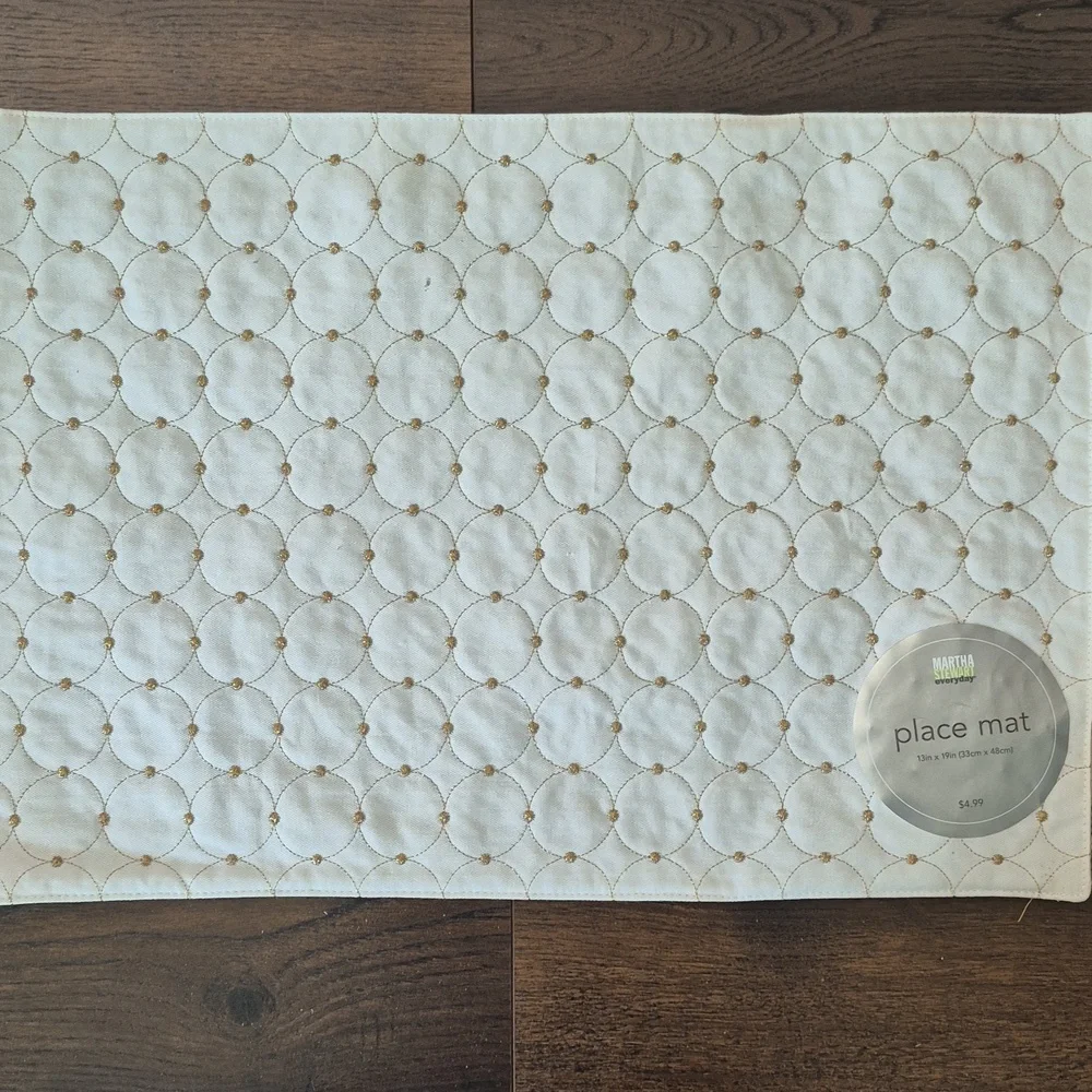 4 Martha Stewart gold sparkle and cream placemats. New from 2008